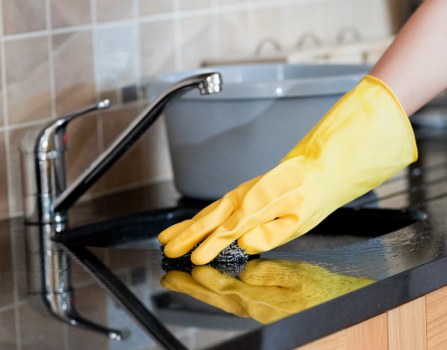 Carpet cleaning team using recyclable supplies and eco-friendly methods