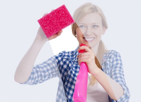 Technician handling cleaning products with care
